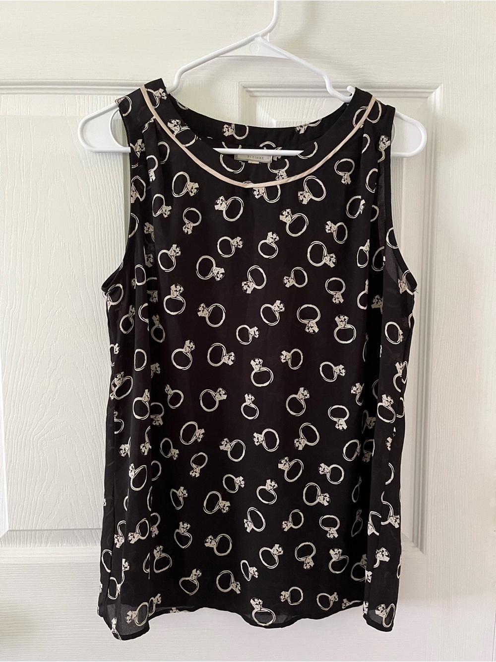 Pleione Black Blouse with Cream Ring Motif